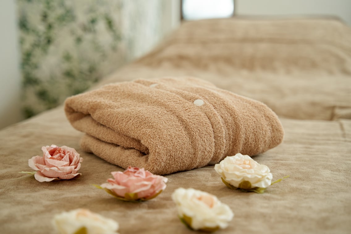 The gown on the bed in the beauty salon
